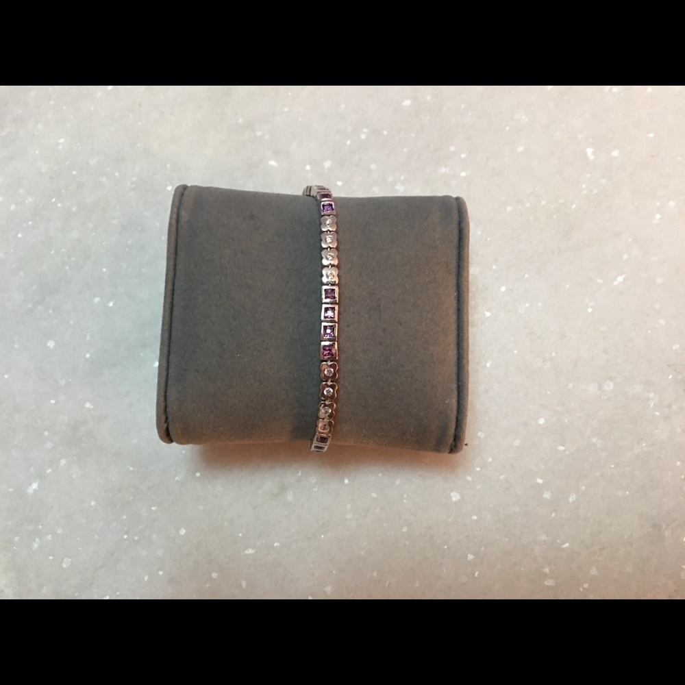 Sterling silver with crystals.